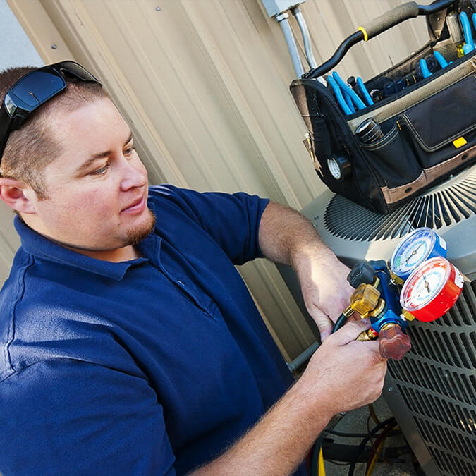 legend Air explains the details of a new system install to a customer.