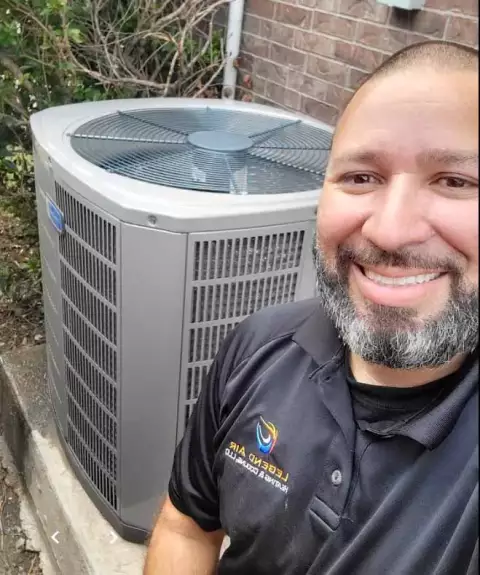 Founder and Owner, Jason Melendez, after the installation of an American Standard heating and cooling system.