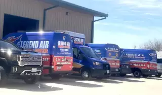 The fleet of service vehicles parked outside the Legend Air warehouse in Little Elm.